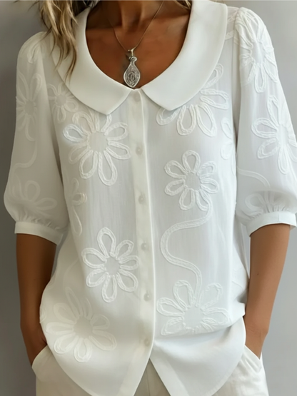 Martina – Camicetta con fiori ricamati