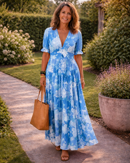 Ione | Abito midi a fiori senza maniche con scollo a V